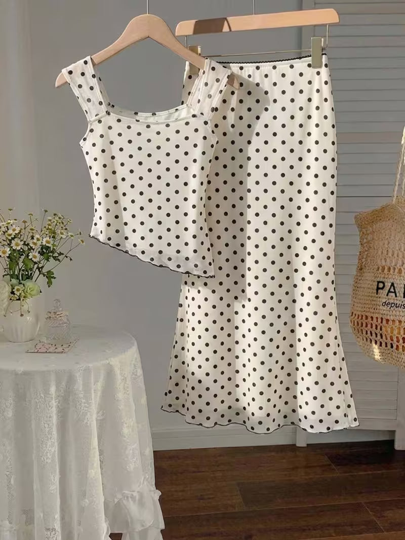 2pcs Polka Dot Skirt Set a Strappy Top with Cap Sleeves and Tie up Detailing, Paired with a Fishtail Skirt Featuring a Lace Waistband, Bow Detail and Cut-out Design. Sweet and Girly with a Retro Vibe, Perfect for Casual Attire, Commuting
