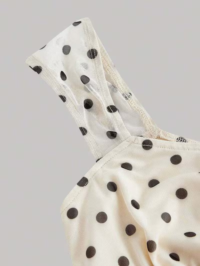 2pcs Polka Dot Skirt Set a Strappy Top with Cap Sleeves and Tie up Detailing, Paired with a Fishtail Skirt Featuring a Lace Waistband, Bow Detail and Cut-out Design. Sweet and Girly with a Retro Vibe, Perfect for Casual Attire, Commuting