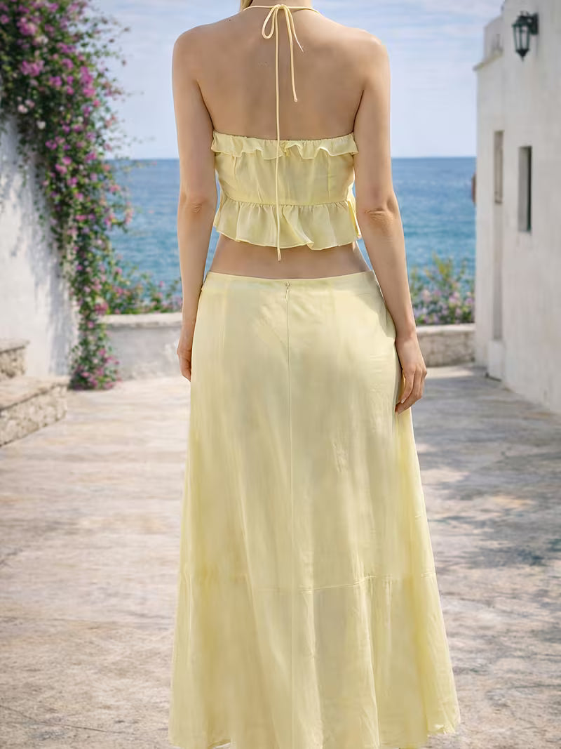 Spring And Summer Women'S Two-Piece Set Featuring a Halter Neck Top with 3D Floral Details And Ruffled Edges, Paired with a High-Waisted Fitted Long Skirt